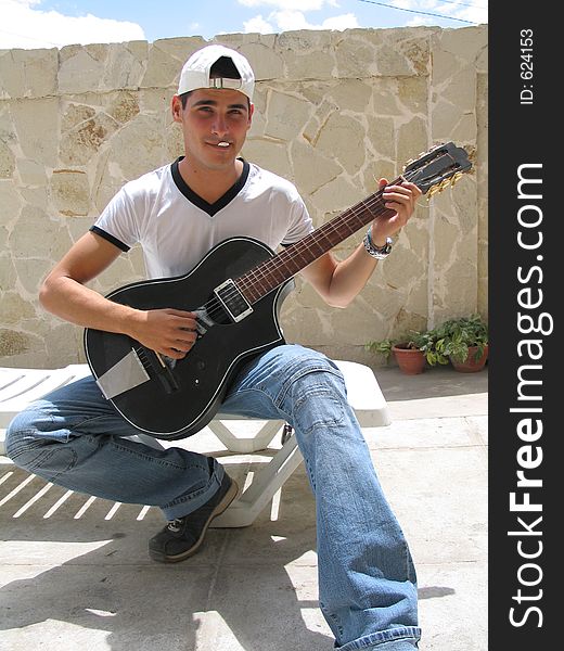 Teenage Playing Guitar