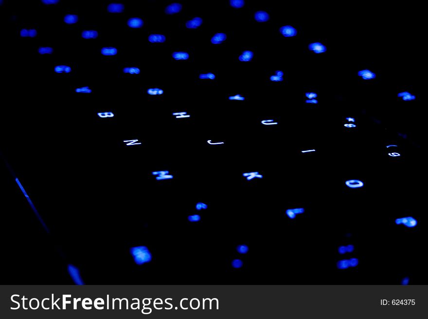 Blue neon Keyboard in a dark area