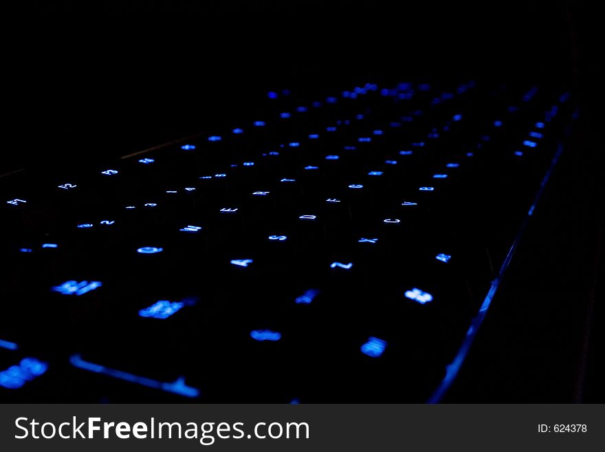 Blue neon Keyboard in a dark area