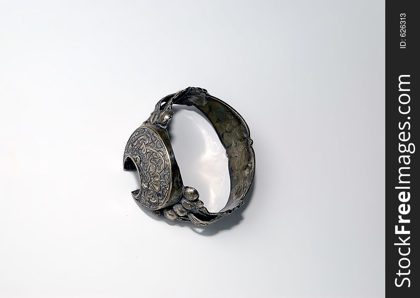 Antique luxury silver napkin-ring artistical decorated with engravings.