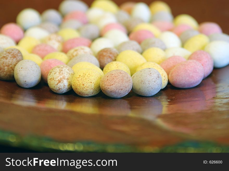 Mini easter eggs on a large dish. Mini easter eggs on a large dish