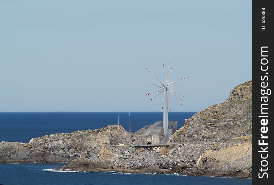 Windmill farm by the Ocean