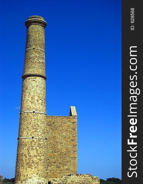 The dominating chimney of the Hughes engine house at Moonta Mines, South Australia. The dominating chimney of the Hughes engine house at Moonta Mines, South Australia.