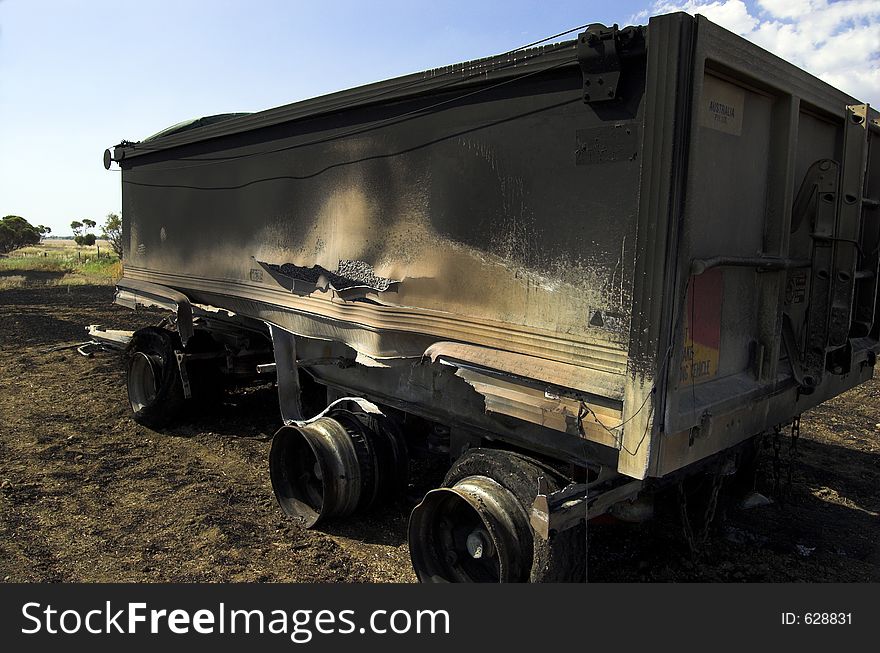 The burnt out wreckage of a truck trailer. The fire was caused by a freak accident. The burnt out wreckage of a truck trailer. The fire was caused by a freak accident.
