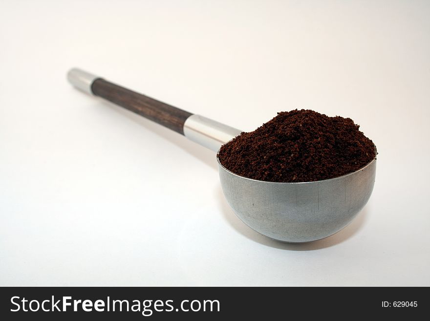 Coffee scoop on white background. Coffee scoop on white background