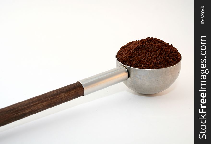 Coffee scoop on white background. Coffee scoop on white background