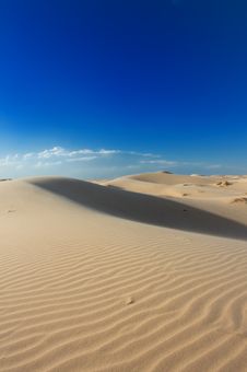 Golden Sand Dunes With A Blue Sky Royalty Free Stock Image Golden Sand Dunes With A Blue Sky Royalty Free Stock Image