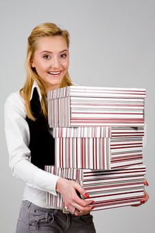 Smiling Young Woman With Stack Of Boxes Stock Photo Smiling Young Woman With Stack Of Boxes Stock Photo