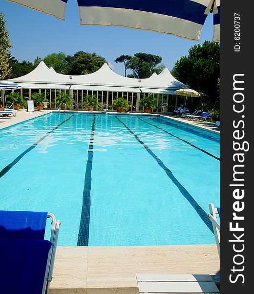 A wonderful shot of a pool in a hotel. A wonderful shot of a pool in a hotel