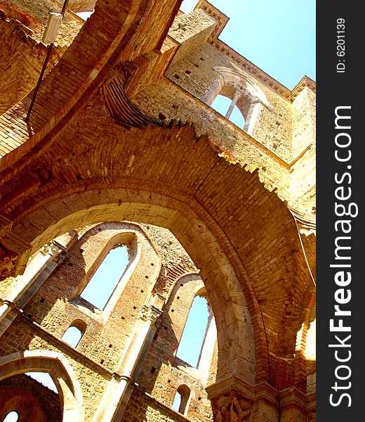 A suggestive shot of the uncover aisles of San Galgano abbey. A suggestive shot of the uncover aisles of San Galgano abbey
