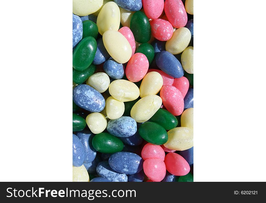 Jelly beans scattered around background.