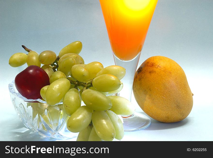 Still life with fruits & mango juice. Still life with fruits & mango juice.