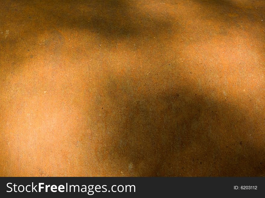 Rusty iron surface with shadows. Background texture.