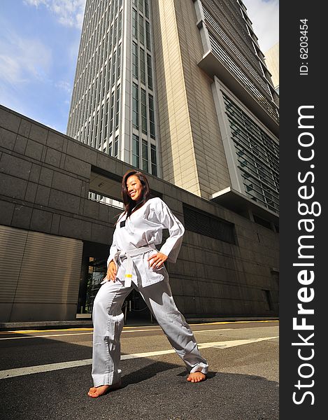 Pictures of Sports Woman relating to the Corporate World. Used to illustrate the similarity between the Karate/ Taekwondo and Business. Pictures of Sports Woman relating to the Corporate World. Used to illustrate the similarity between the Karate/ Taekwondo and Business.