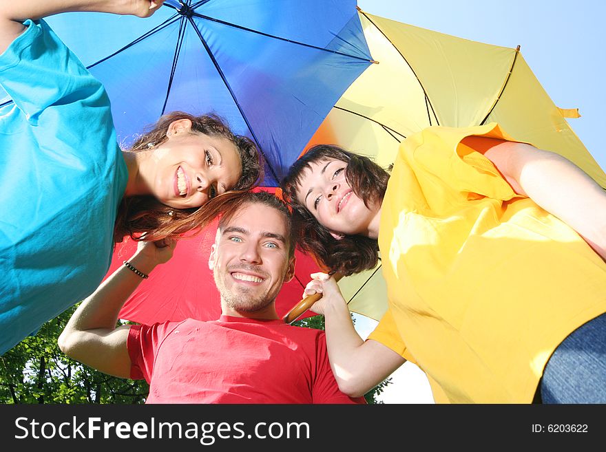 Funny colorful friends with umbrellas. Funny colorful friends with umbrellas