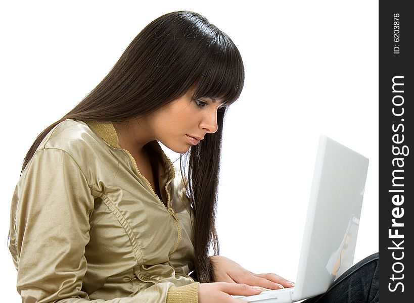 Female Student Sitting With Laptop On Her Lap