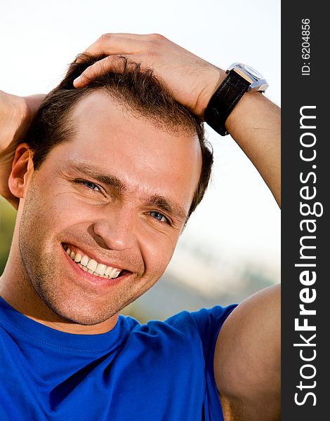 Portrait of smiling caucasian man outdoors. Portrait of smiling caucasian man outdoors