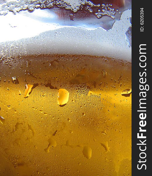 A glass of cold beer. A glass of cold beer