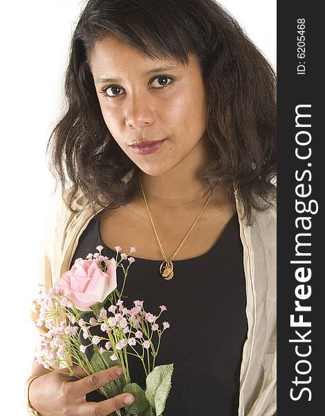 Portrait of a young attractive woman with flowers