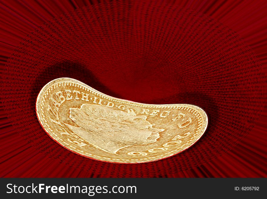 Distorted english pound coin with queen's head