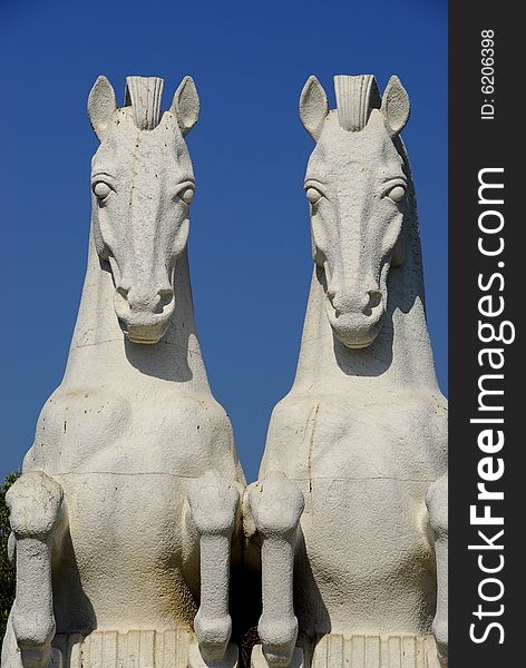 Horses statue in Jeronimos Garden   Monastery, Empire Square, Belem, Portugal.