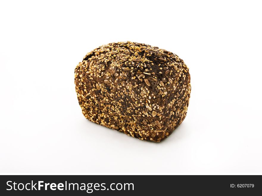 Appetizing brown bread upon white background. Appetizing brown bread upon white background