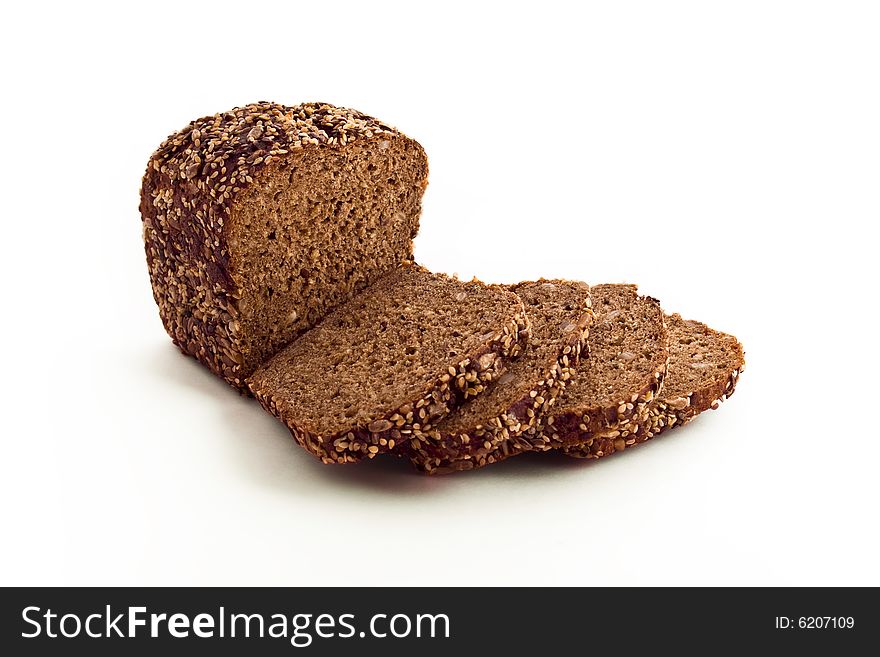 Appetizing brown bread upon white background. Appetizing brown bread upon white background