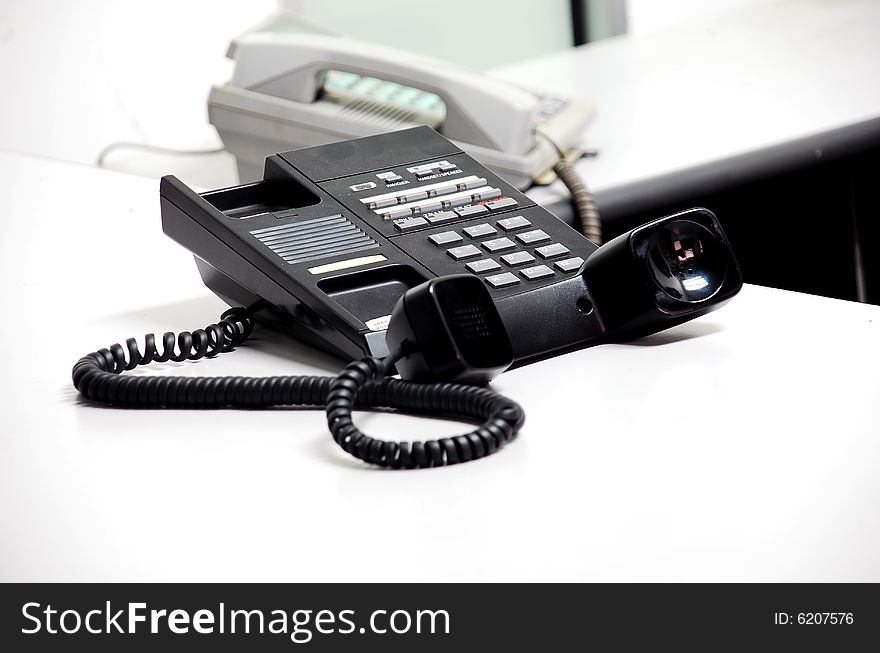 Black telephone image on the office table