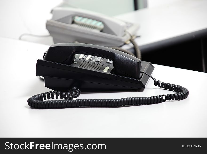 Black telephone image on the office table