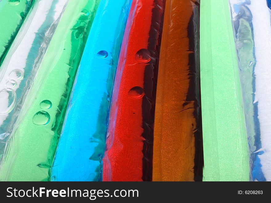 Blue, red, brown and green liquid background. Blue, red, brown and green liquid background