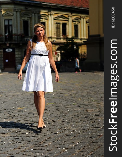 Portrait of a young attractive girl in the city. Portrait of a young attractive girl in the city