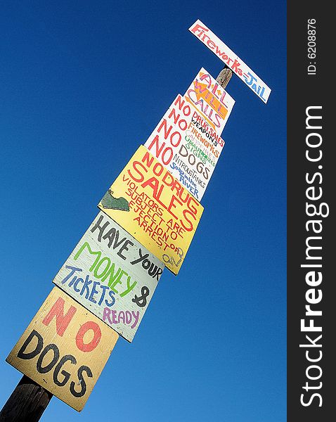 Tower of Signs Posted in Entrance of Music Festival