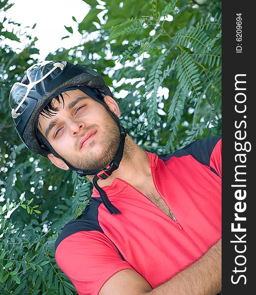 Portrait of cyclist in the protective helmet
