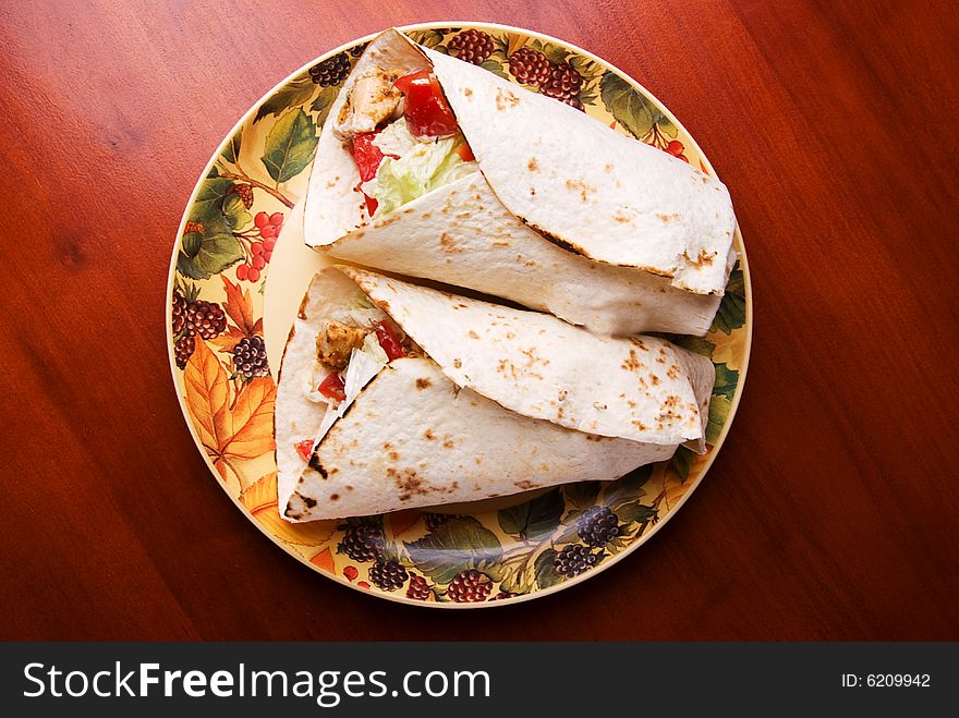 Tortilla; traditional mexican food; fast-food with chicken. Tortilla; traditional mexican food; fast-food with chicken