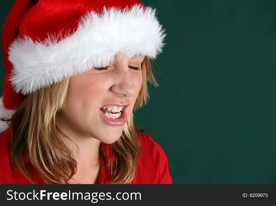 Annoyed teenager expressing her feelings about christmas. Annoyed teenager expressing her feelings about christmas