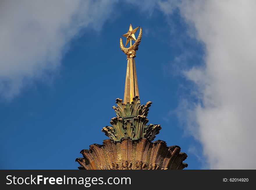 The spire with the emblem of the Soviet Union on the Ukraine pavilion at All-Russia Exhibition Centre
