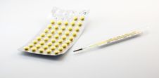 Pills And Thermometer Stock Photography Pills And Thermometer Stock Photography