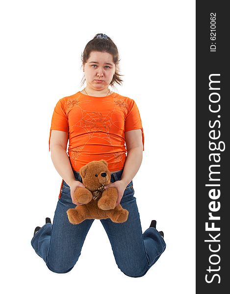 Young woman with toy on knees