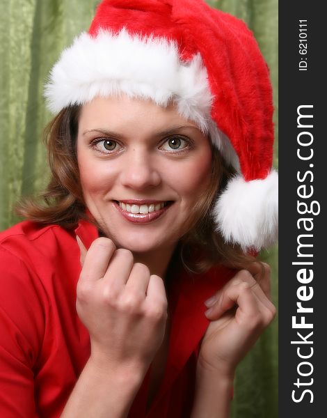 Beautiful Mature christmas female wearing a red hat. Beautiful Mature christmas female wearing a red hat
