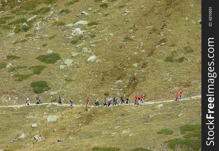 Group of hikers in the mountains. Group of hikers in the mountains