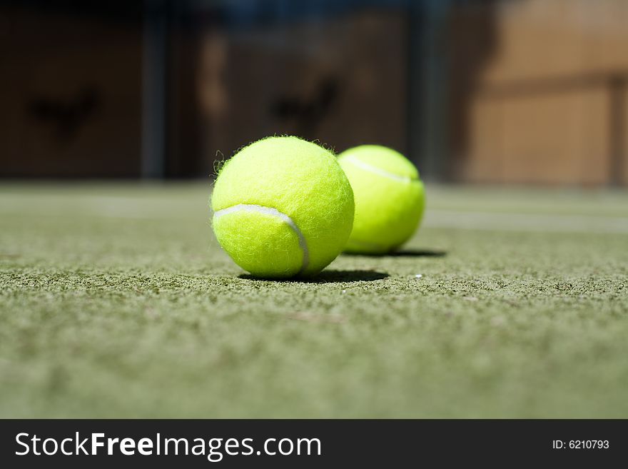 Tennis balls on the tennis court