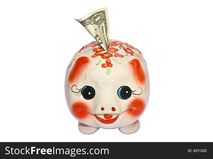 Painted piggy bank with one dollar on a white background