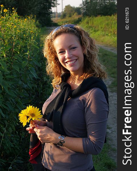 Curly girl with flowers