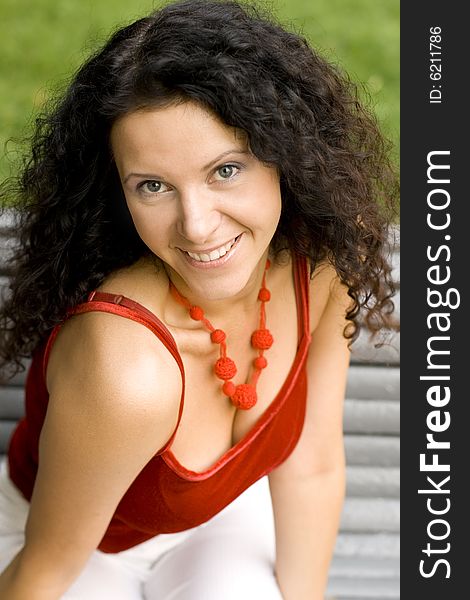 Outdoor portrait of smiling attractive woman. Outdoor portrait of smiling attractive woman