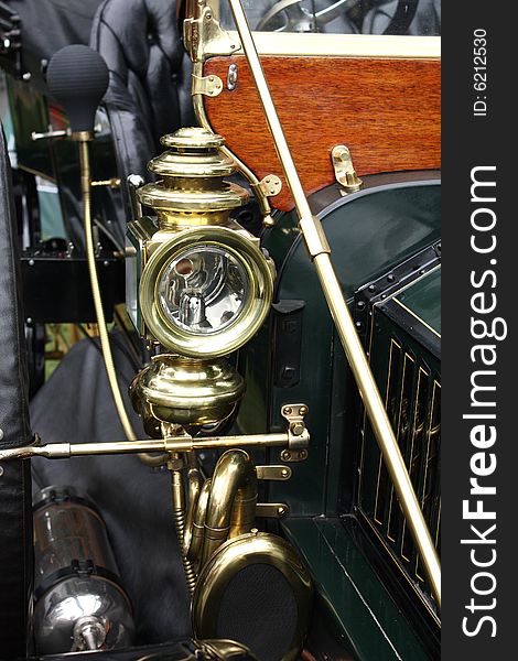 Brass lamp on vintage American steam car. Brass lamp on vintage American steam car.