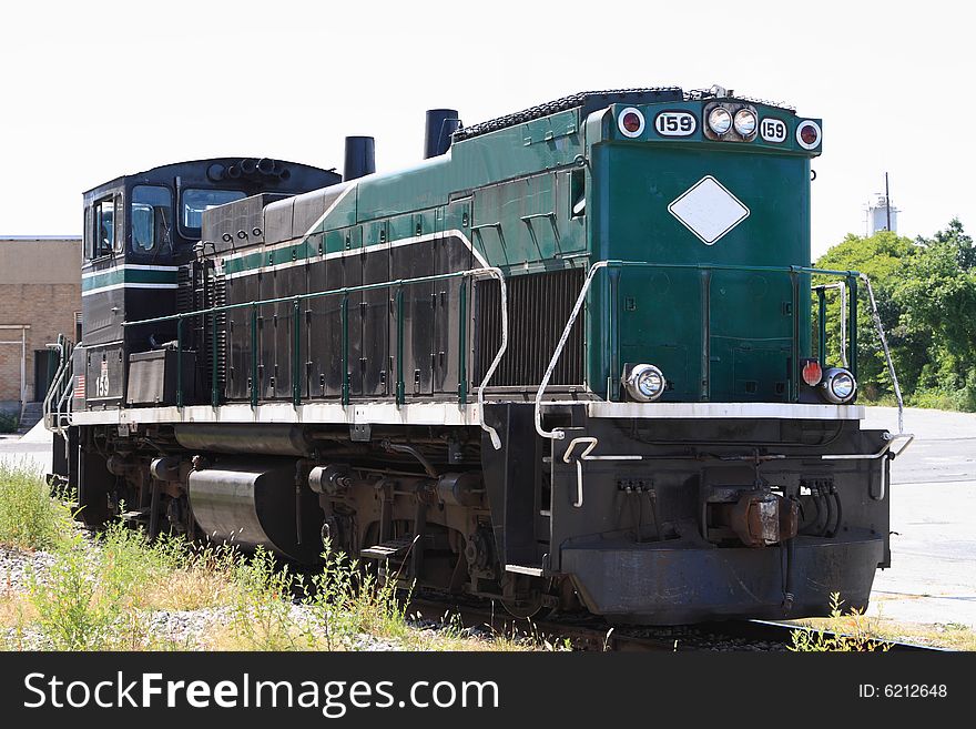 Diesel railroad Locomotive engine on a side track. Diesel railroad Locomotive engine on a side track