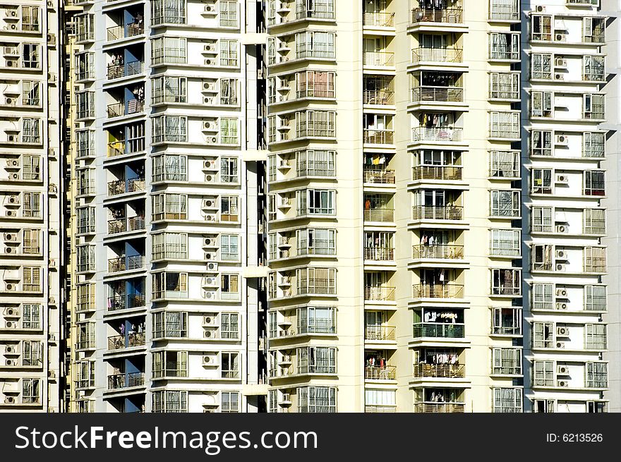 China, Shanghai - closeup photo of modern buildings with visable windows and balconies. China, Shanghai - closeup photo of modern buildings with visable windows and balconies.