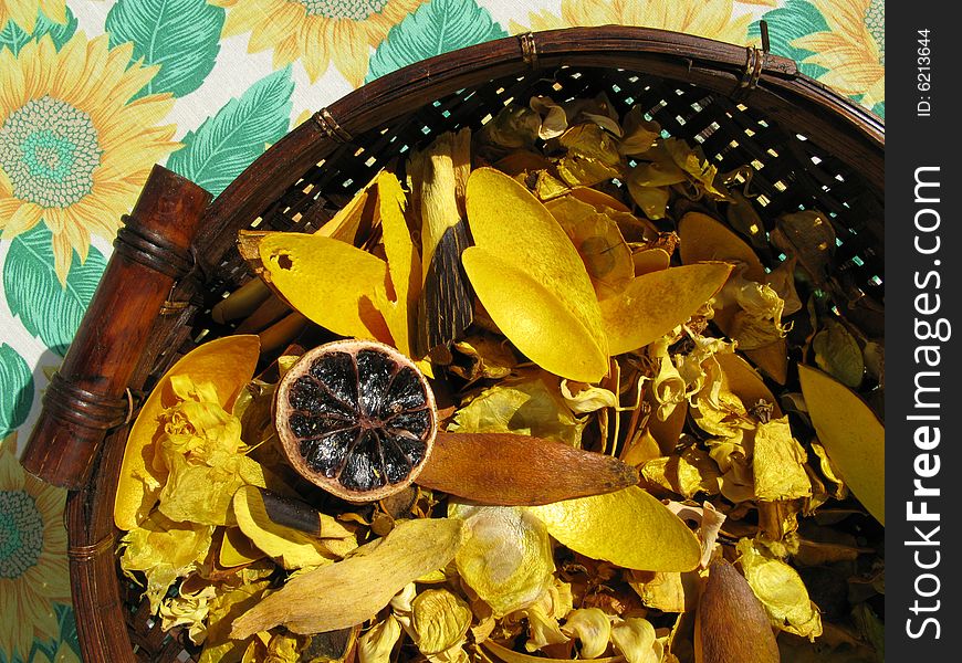 Close-up of a yellow potpourri in a basket. Close-up of a yellow potpourri in a basket