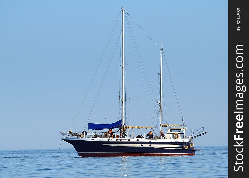 Sailboat sailing in the morning. Sailboat sailing in the morning