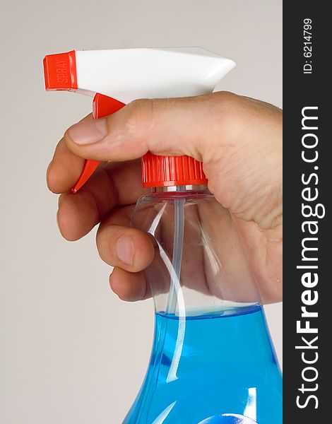 An image of plastic bottle with liquid for cleining. An image of plastic bottle with liquid for cleining